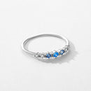Anillo de Plata 925 con Tachuelas de Circonitas Azules